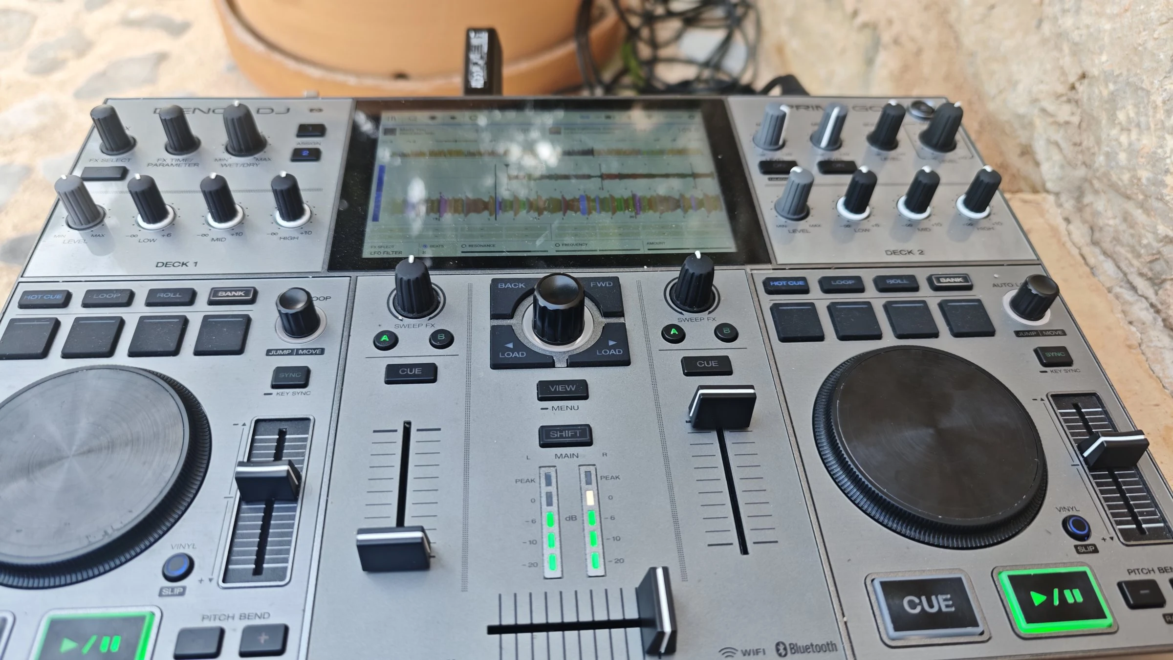 Denon Prime Go on a natural stone wall in Sant Llorenç des Cardassar